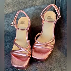 Metallic pink platform heels